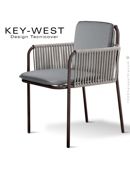 Fauteuil KEY-WEST, acier peint bronze, assise et dossier coussins tissu argent, accoudoirs tressage corde crème.